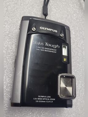 Olympus Stylus Tough 6020 14 MP Digital Camera w/5X wide angle zoom With Battery